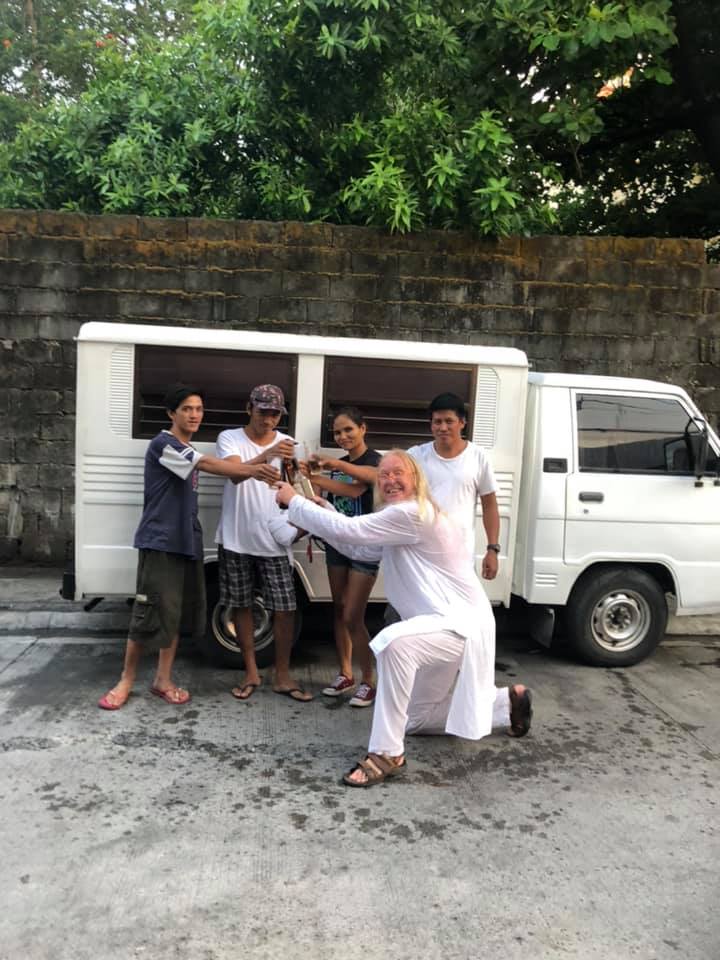 A child smiling and drawing